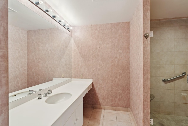 14 Greenway Plz Unit 19R, Houston, TX 77046 - full bath with tile patterned flooring, a tile shower, and vanity