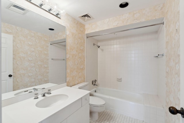 14 Greenway Plz Unit 19R, Houston, TX 77046 - bathroom featuring tile patterned floors, toilet, tub / shower combination, and vanity