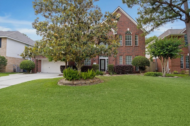 5111 Maple Hill Trl, Houston, TX 77345 - view of front of house featuring brick siding, concrete driveway, a front lawn, and a garage
