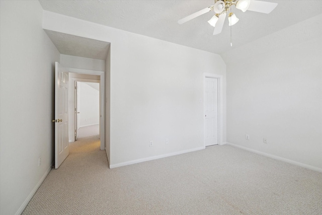 5111 Maple Hill Trl, Houston, TX 77345 - empty room with light carpet, a ceiling fan, and baseboards