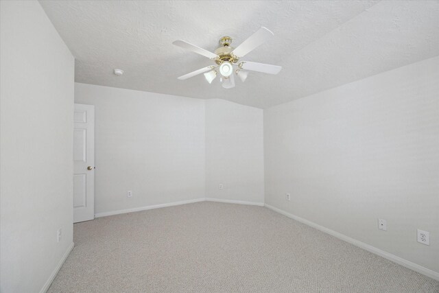 5111 Maple Hill Trl, Houston, TX 77345 - unfurnished room with carpet floors, ceiling fan, a textured ceiling, and baseboards
