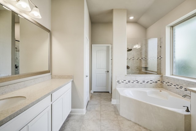 19723 Hale Hollow Creek Dr, Cypress, TX 77433 - full bath with tiled shower, a bath, vanity, tile patterned flooring, and recessed lighting