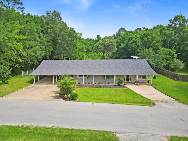 4420 Shady Ln, Huntsville, TX 77320 - view of front of house featuring driveway, a view of trees, roof with shingles, and covered porch