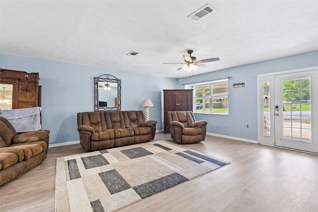 4420 Shady Ln, Huntsville, TX 77320 - living room with ceiling fan, wood finished floors, and baseboards