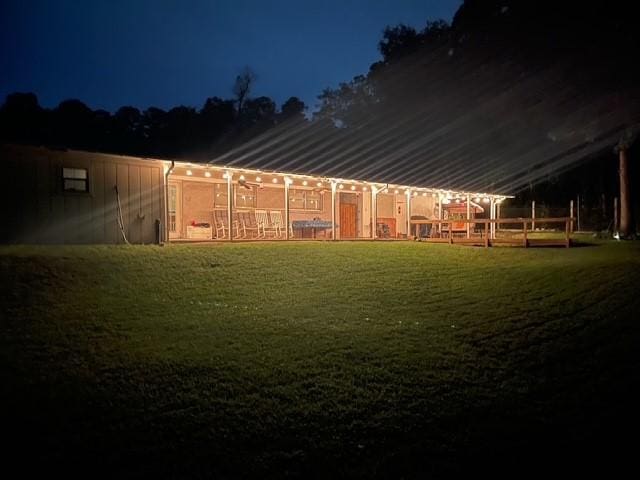 4420 Shady Ln, Huntsville, TX 77320 - yard at twilight with a lawn