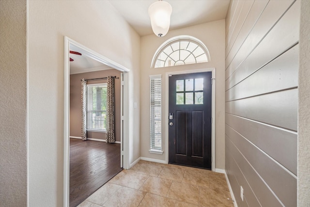 5332 Pointe Spring Xing, Spring, TX 77389 - entrance foyer with light tile patterned floors and baseboards