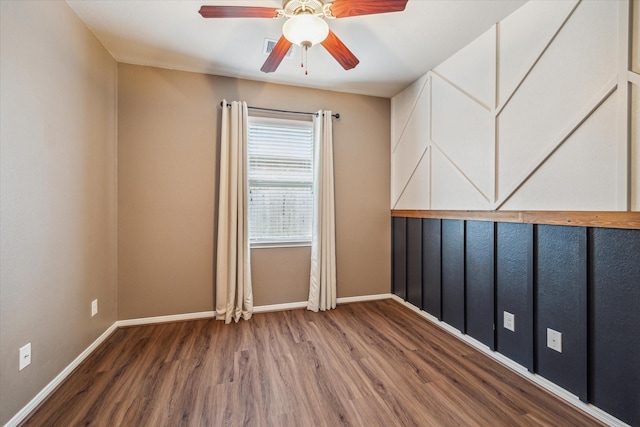 5332 Pointe Spring Xing, Spring, TX 77389 - unfurnished room with wood finished floors, a ceiling fan, and baseboards