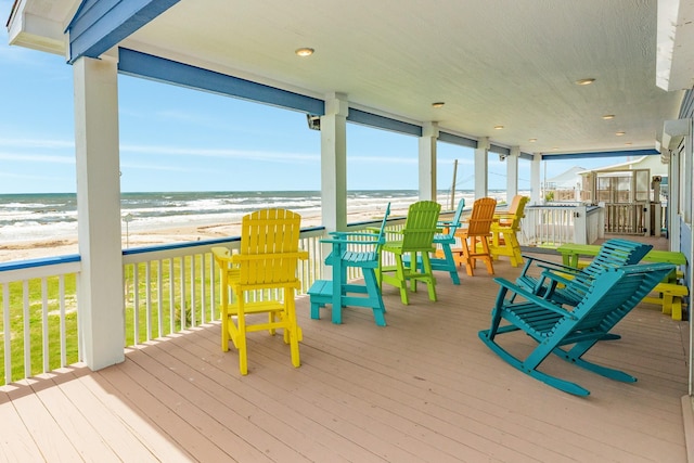 998 Austin Dr, Gilchrist, TX 77617 - deck featuring view of water and beach