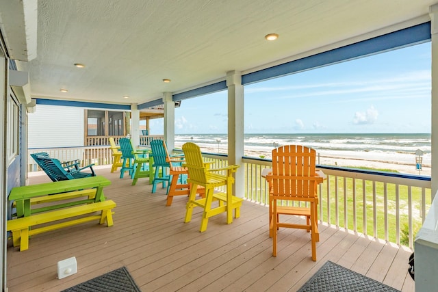 998 Austin Dr, Gilchrist, TX 77617 - wooden terrace with view of water and beach