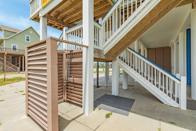 998 Austin Dr, Gilchrist, TX 77617 - view of patio featuring stairway
