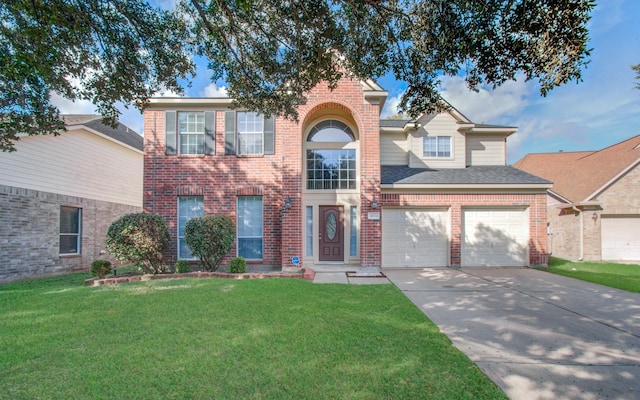 14814 Bridle Bend Dr, Houston, TX 77084 - traditional home with brick siding, driveway, a front yard, and a garage