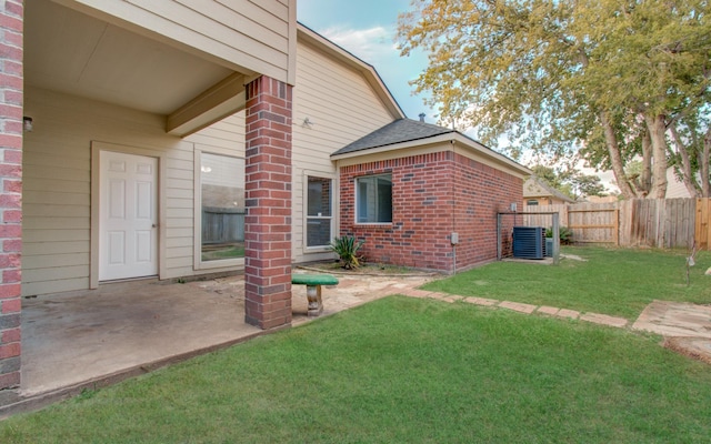 14814 Bridle Bend Dr, Houston, TX 77084 - view of yard with a patio area and central air condition unit