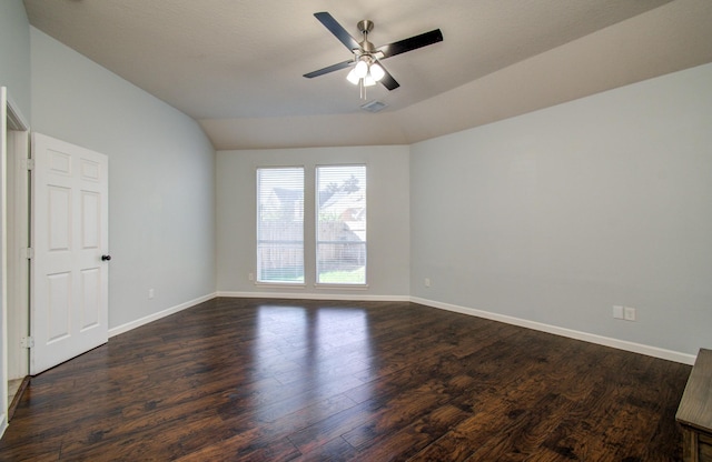 14814 Bridle Bend Dr, Houston, TX 77084 - spare room with lofted ceiling, baseboards, dark wood-style floors, and ceiling fan