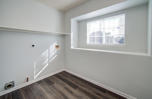 14814 Bridle Bend Dr, Houston, TX 77084 - clothes washing area featuring electric dryer hookup, dark wood-style floors, baseboards, hookup for a washing machine, and gas dryer hookup