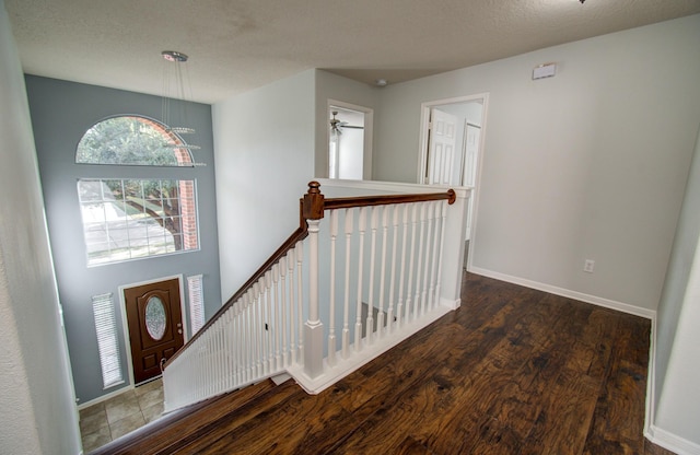 14814 Bridle Bend Dr, Houston, TX 77084 - entrance foyer featuring wood finished floors, baseboards, and a ceiling fan