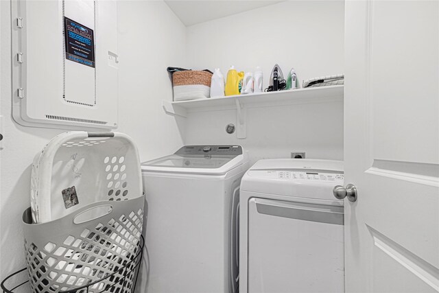 17723 Seed Drill Ln, Hockley, TX 77447 - clothes washing area featuring washing machine and clothes dryer