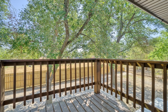 1021 S State St, Madisonville, TX 77864 - wooden deck featuring a fenced backyard