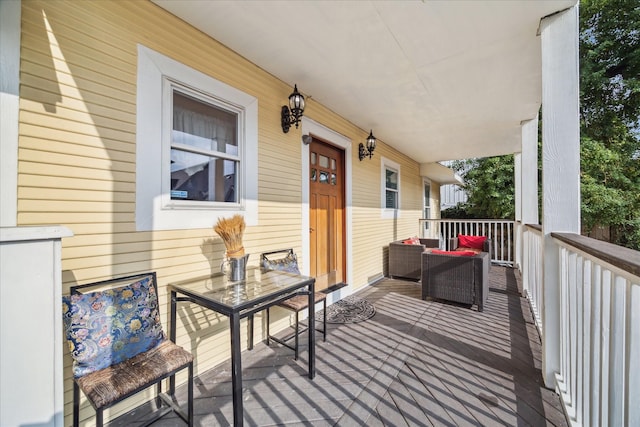 1502 Stuart St, Houston, TX 77004 - wooden terrace featuring covered porch and an outdoor living space