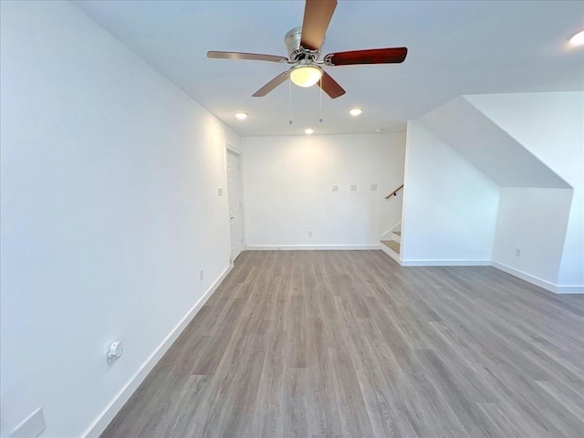 6309 Sandra St, Houston, TX 77028 - additional living space featuring ceiling fan, wood finished floors, stairs, baseboards, and recessed lighting