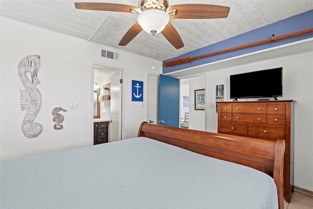 7310 Seawall Blvd Unit 707, Galveston, TX 77551 - bedroom featuring a ceiling fan and tile patterned flooring