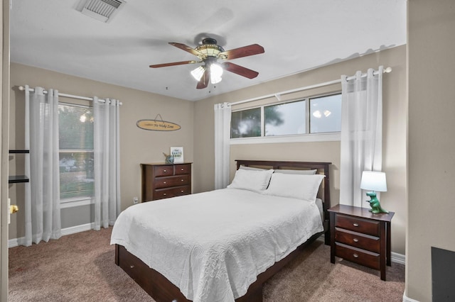 19634 Stone Lake Dr, Tomball, TX 77377 - carpeted bedroom with baseboards and ceiling fan