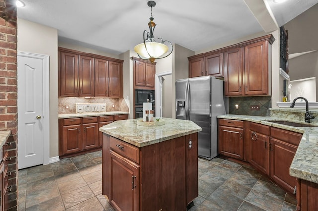 19634 Stone Lake Dr, Tomball, TX 77377 - kitchen featuring a sink, stainless steel fridge with ice dispenser, black microwave, and dark stone finish floors