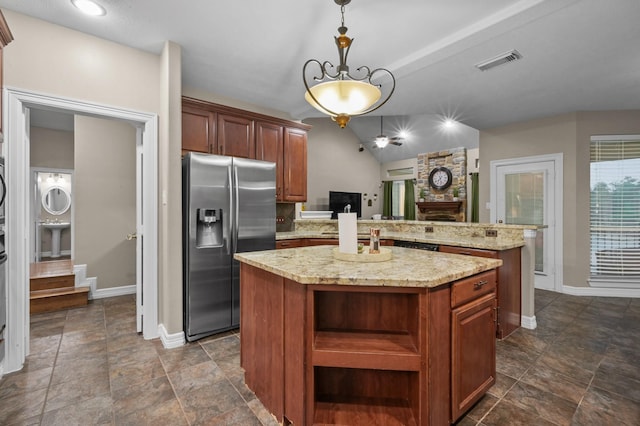 19634 Stone Lake Dr, Tomball, TX 77377 - kitchen featuring stainless steel fridge, a center island, baseboards, open shelves, and lofted ceiling