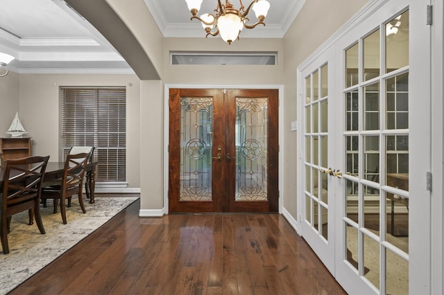 19634 Stone Lake Dr, Tomball, TX 77377 - entrance foyer featuring french doors, a chandelier, wood-type flooring, ornamental molding, and baseboards