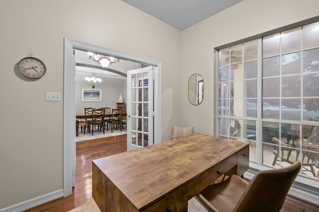 19634 Stone Lake Dr, Tomball, TX 77377 - dining area with a chandelier and wood finished floors