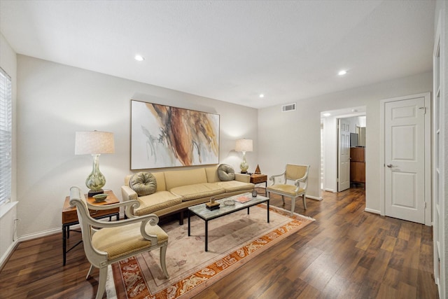 606 Marshall St Unit C2, Houston, TX 77006 - living room featuring baseboards, dark wood-style flooring, and recessed lighting