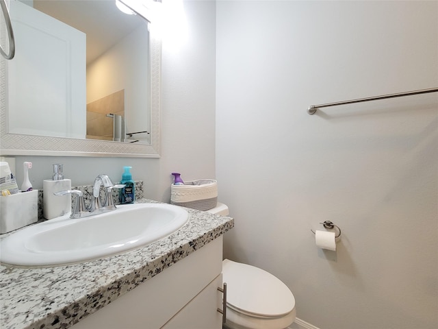 18841 Elegance Ave, Spring, TX 77379 - bathroom featuring vanity, toilet, and a shower