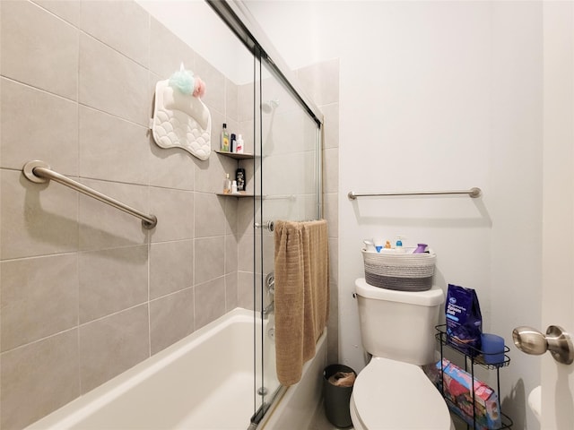 18841 Elegance Ave, Spring, TX 77379 - bathroom featuring toilet and bath / shower combo with glass door