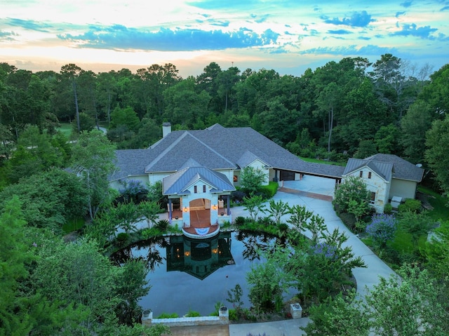 9502 Clubhouse Cir, Magnolia, TX 77354 - view of subject property featuring a forest