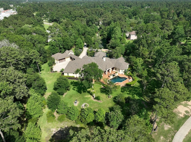 9502 Clubhouse Cir, Magnolia, TX 77354 - aerial view of property and surrounding area with a heavily wooded area