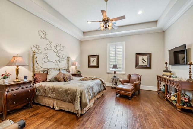 9502 Clubhouse Cir, Magnolia, TX 77354 - bedroom featuring a raised ceiling, wood-type flooring, baseboards, ceiling fan, and ornamental molding
