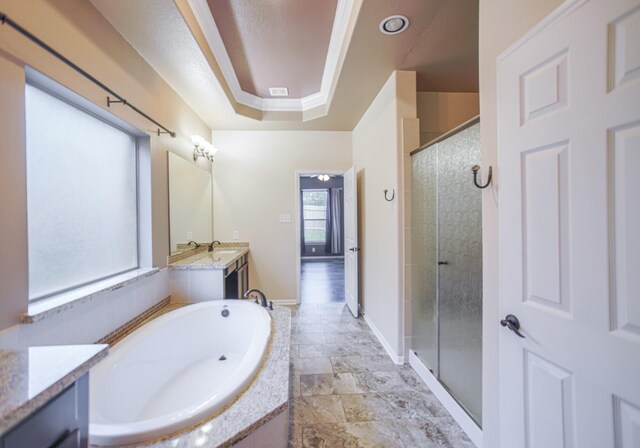 27326 Pendleton Trace Dr, Spring, TX 77386 - bathroom with a stall shower, a garden tub, vanity, baseboards, and a raised ceiling