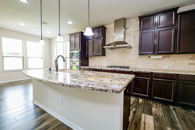 27326 Pendleton Trace Dr, Spring, TX 77386 - kitchen with wall chimney exhaust hood, a sink, stainless steel appliances, dark wood-style floors, and recessed lighting