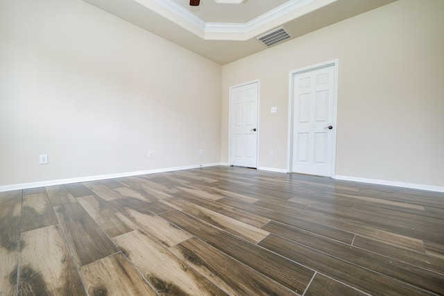 27326 Pendleton Trace Dr, Spring, TX 77386 - empty room featuring a raised ceiling, wood finished floors, ceiling fan, crown molding, and baseboards