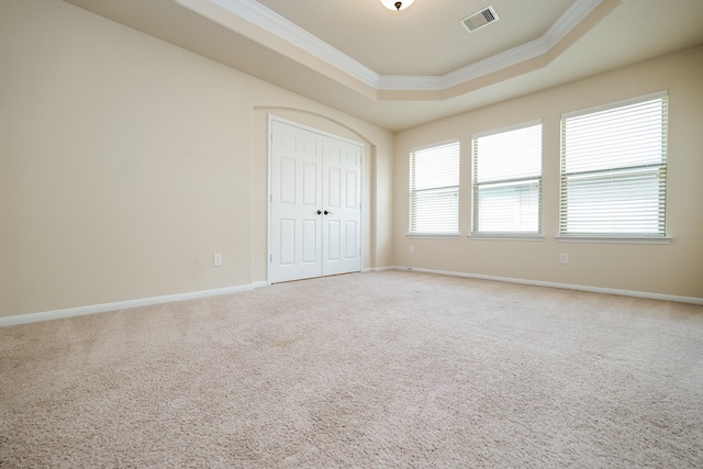 27326 Pendleton Trace Dr, Spring, TX 77386 - unfurnished bedroom with ornamental molding, a raised ceiling, carpet, baseboards, and a closet