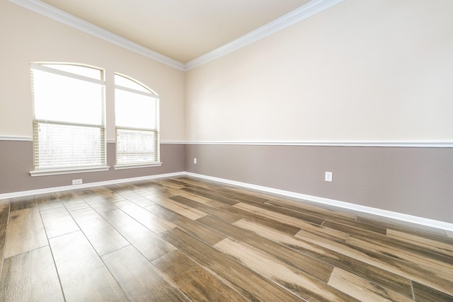 27326 Pendleton Trace Dr, Spring, TX 77386 - empty room with ornamental molding, baseboards, and wood finished floors