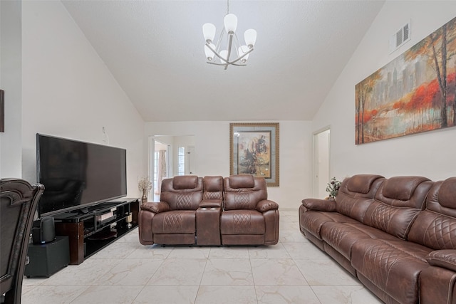 25514 Wingfield Ln, Spring, TX 77373 - living area with a chandelier, high vaulted ceiling, and light marble finish floors