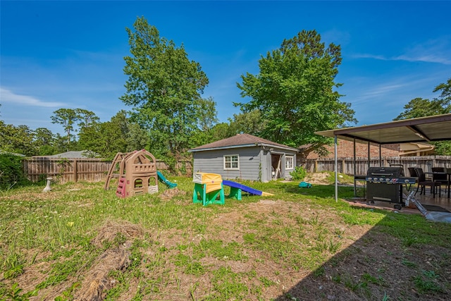 25514 Wingfield Ln, Spring, TX 77373 - view of yard with an outbuilding and a playground