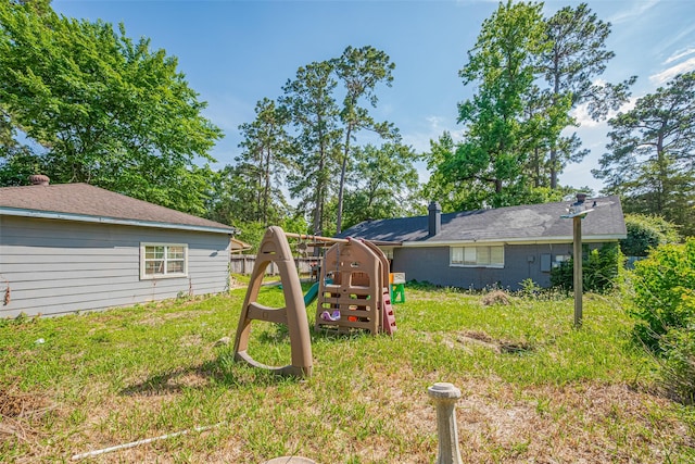 25514 Wingfield Ln, Spring, TX 77373 - view of grassy yard with a playground