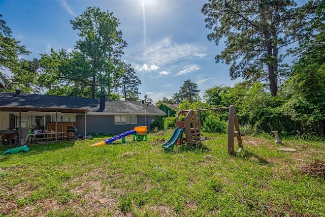 25514 Wingfield Ln, Spring, TX 77373 - view of green lawn featuring a playground