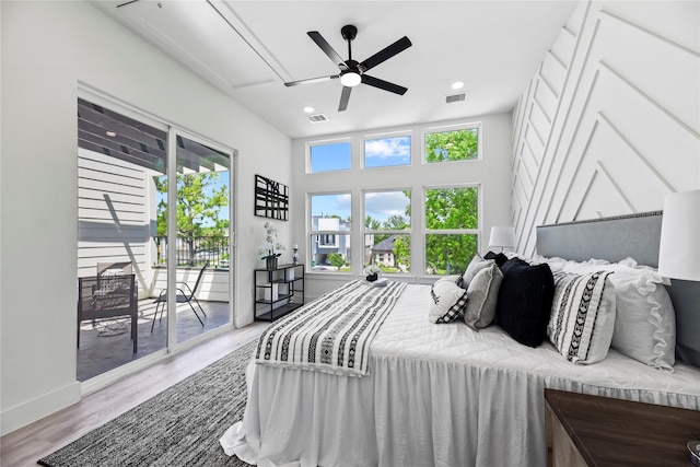 7212 England St, Houston, TX 77021 - bedroom featuring access to exterior, wood finished floors, ceiling fan, recessed lighting, and baseboards