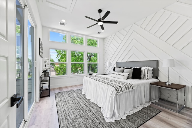 7212 England St, Houston, TX 77021 - bedroom with multiple windows, wood finished floors, a ceiling fan, and recessed lighting
