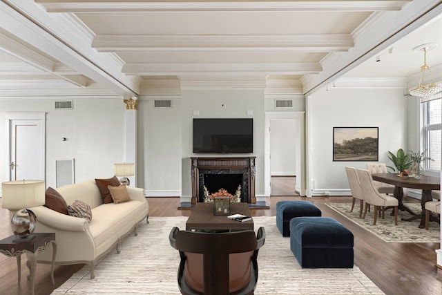 1700 Main St Unit 7B, Houston, TX 77002 - living area featuring crown molding, beam ceiling, wood finished floors, a fireplace, and baseboards