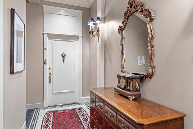 1700 Main St Unit 7B, Houston, TX 77002 - foyer with baseboards and crown molding