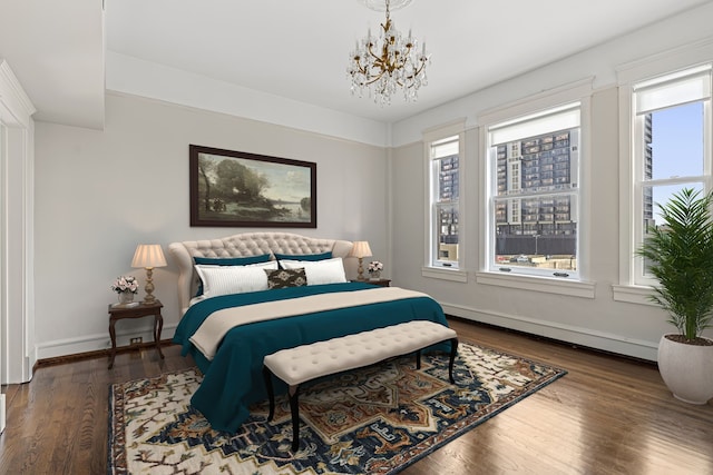 1700 Main St Unit 7B, Houston, TX 77002 - bedroom with multiple windows, a chandelier, and wood finished floors