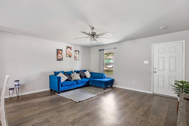 11260 Hodge Rd, Beaumont, TX 77713 - living room with ceiling fan, wood finished floors, and baseboards